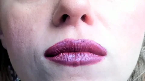 Blonde with red lipstick gives intense close-up oral tease
