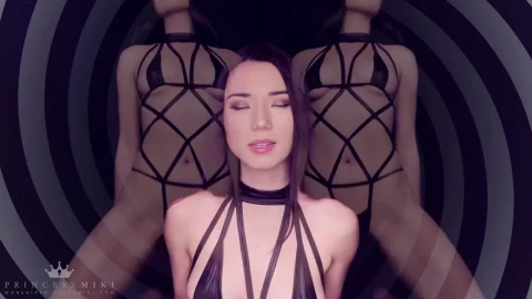 Asian femme in purple-lit studio teases in lingerie, spreads for close
